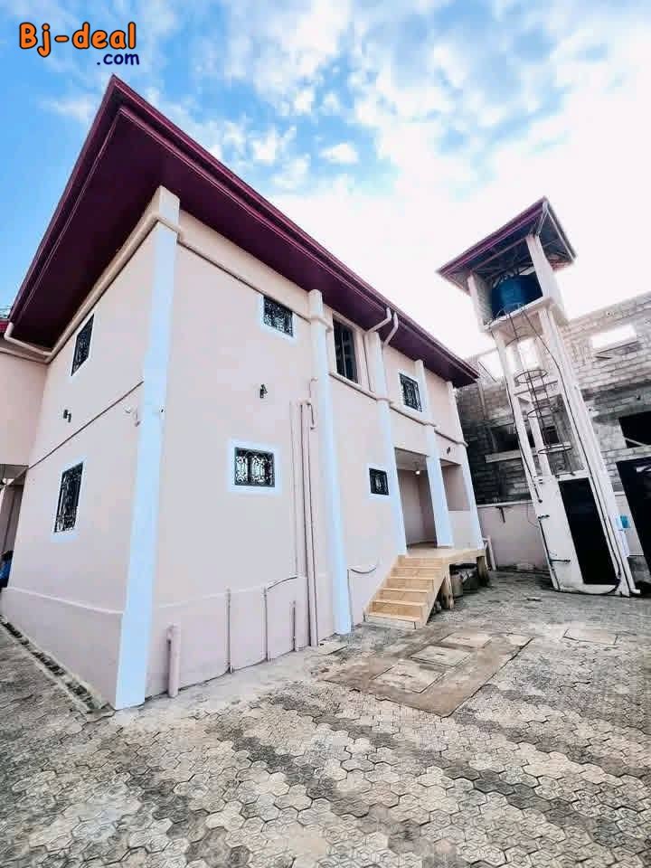 Main image of Beau duplex avec eau chaude forage parking à Massassi Nyom
