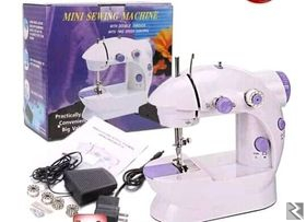 Image principale de MINI MACHINE A COUDRE ELECTRIQUE